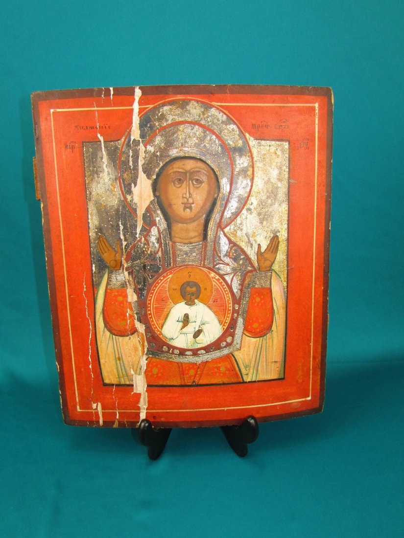 Russian IconThe Mother of God of Smolensk Oil on Panel: Russian Icon 19th/20th Century, Subject (The Mother of God of Smolensk) Kholuy, size 12"x14" Oil tempera on carved panel with slats to the rear of the panel.Finely detailed work with some paint loss a
