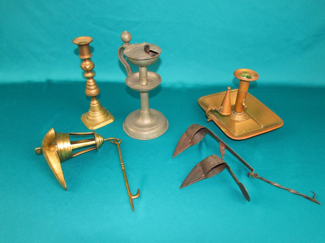 Early Lighting Group of 5 Late 18th Early 19th Century: Early lighting grouping consisting of 5 pieces. 1x Late 18th century American hand forged wrought iron grease lamp with nested second lamp with wrought hanger/wick pick. 11 1/4" x 4", 1x 19th century 