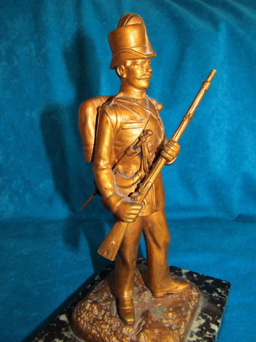 Carl Kauba Signed Bronze Soldier Austria 19th Century: 19th Century Signed gold gilt bronze Austrian Grenadier on polished granite by Carl Kauba Austria, 1865-1922.A seldom seen pristine example of his early works with much of the original gold gilt remai