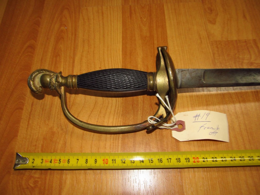 French Napoleonic War Sergeants Sword 1805: French Napoleonic War Sergeants Sword 1805, Gilt guard and pommel, cuirassier helmet pommel, straight blade engraved with blade motifs, ebony checkered grips.