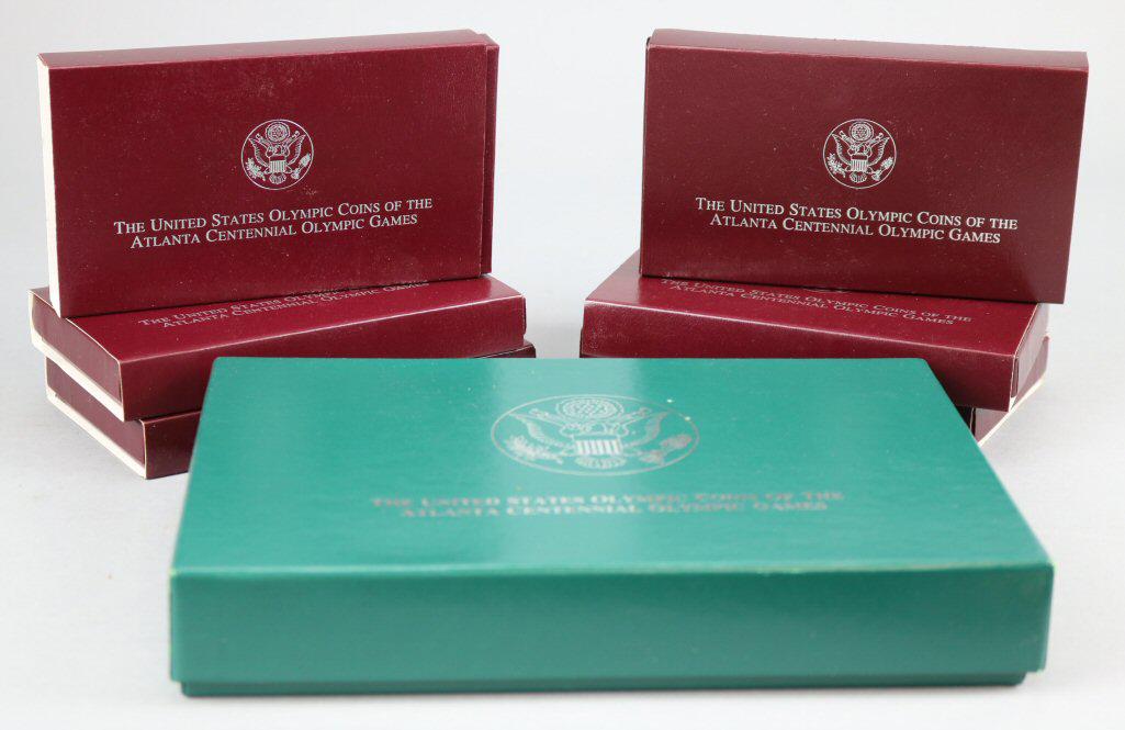 1996 U.S. Mint Atlanta Olympics 8 Coin Set 90 % Silver: Incl: Blind Runner, Gymnast, Track & Field, Cycling, Rowing, High Jump, Tennis, & Wheelchair coins. All with original individual packaging.