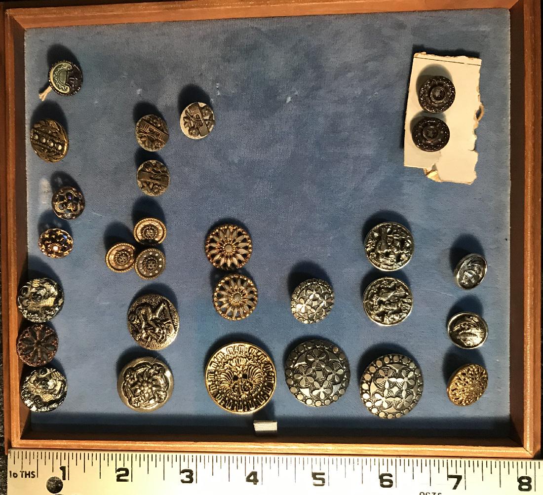 Lot of Buttons Including Victorian: A lot of buttons including Victorian cut steel and glass examples. Good condition with wear commensurate with age and use. For dimensions, see photographs.