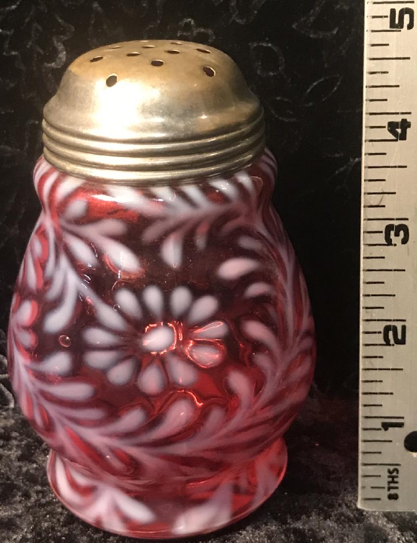 Daisy & Fern Cranberry Opalescent Sugar Shaker: A Northwood cranberry opalescent glass wide waisted glass sugar shaker in the "Daisy & Fern" pattern, late 19th century. Good condition with small flakes and roughness to the threaded rim (under the l