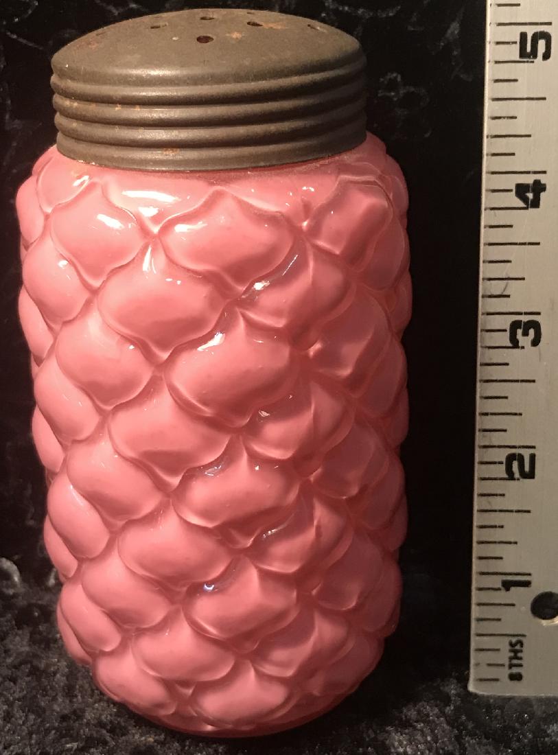 Consolidated Pinecone Sugar Shaker: A Consolidated pink opaque cased glass "Pinecone" sugar shaker. Good condition with roughness to the threaded rim (under the lid), as manufactured. Plate wear to the lid. For dimensions, see photograp