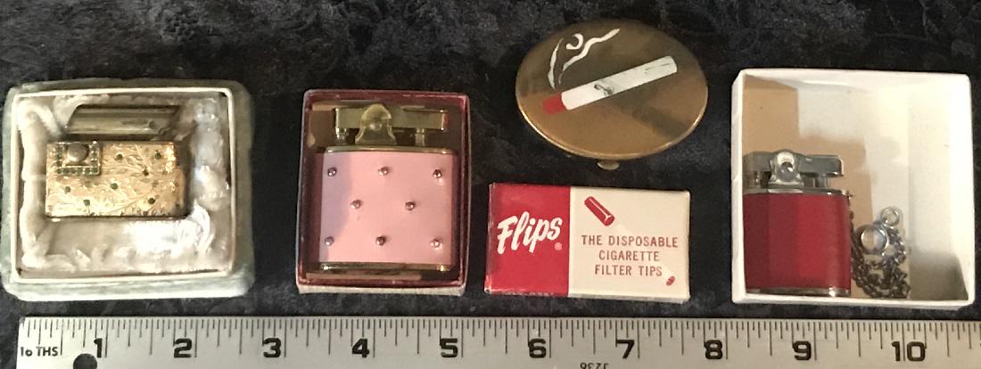 3 Vintage Lighters: Three vintage lighters, together with a compact ashtray. Good condition with wear commensurate with age. For dimensions, see photographs.