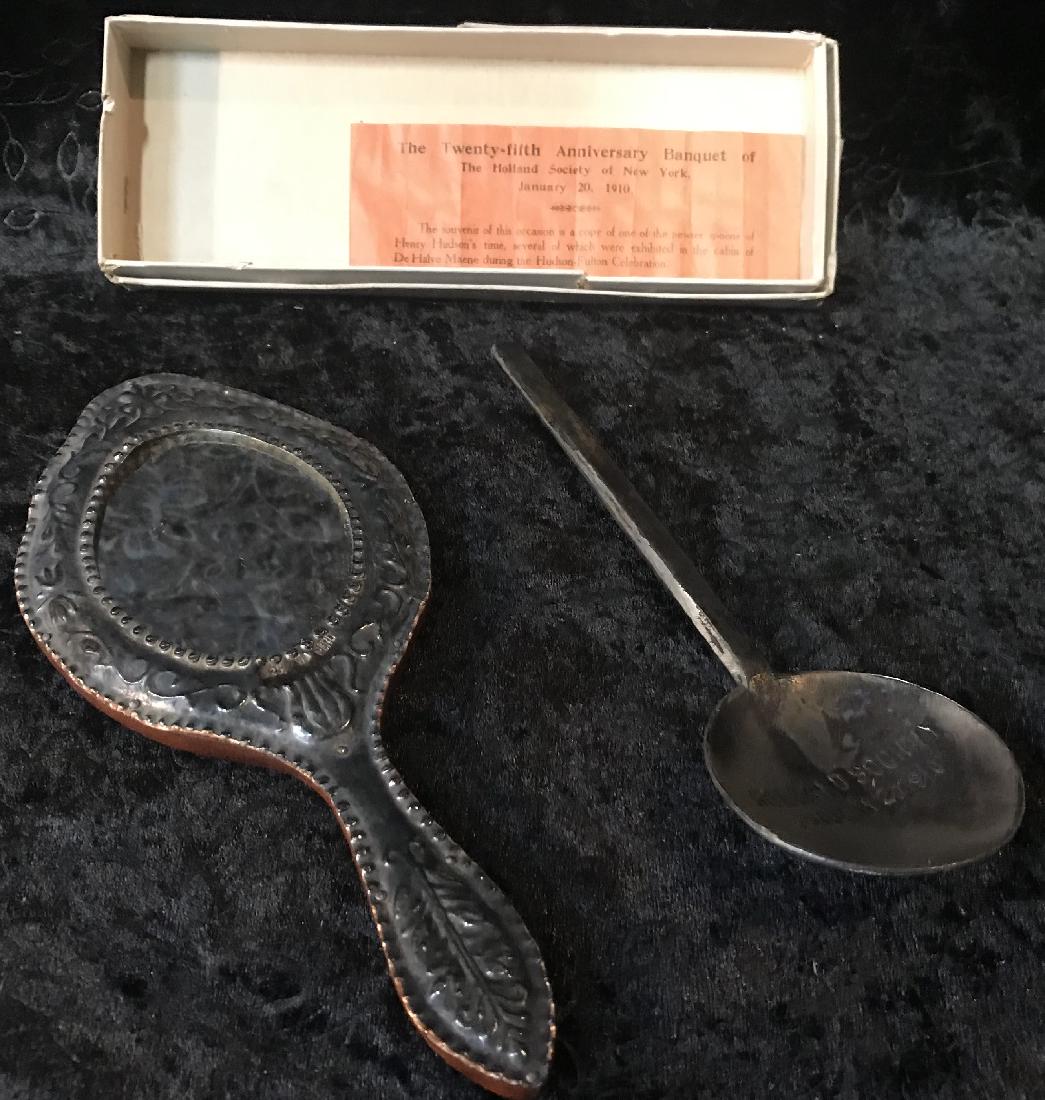 Sterling Silver & Wood Hand Mirror: A sterling silver and wood hand mirror, together with a Holland Society spoon. Good condition with wear commensurate with age. For dimensions, see photographs.