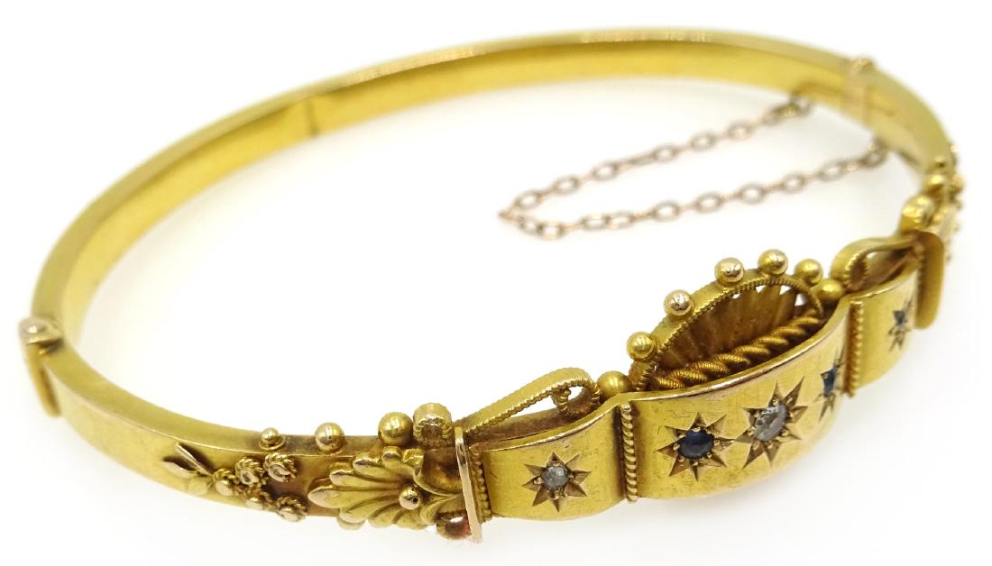 Gold diamond and sapphire set hinged bangle, stamped (1 of 5)
