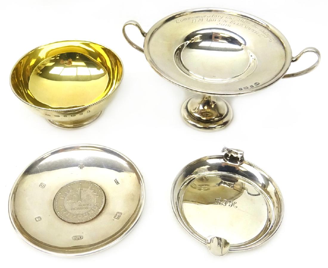 Silver ashtray with cow decoration by Kenneth Tyler Key: Silver ashtray with cow decoration by Kenneth Tyler Key Birmingham 1960, silver comport, silver bowl gilded interior, and a £5 coin dish approx 10oz