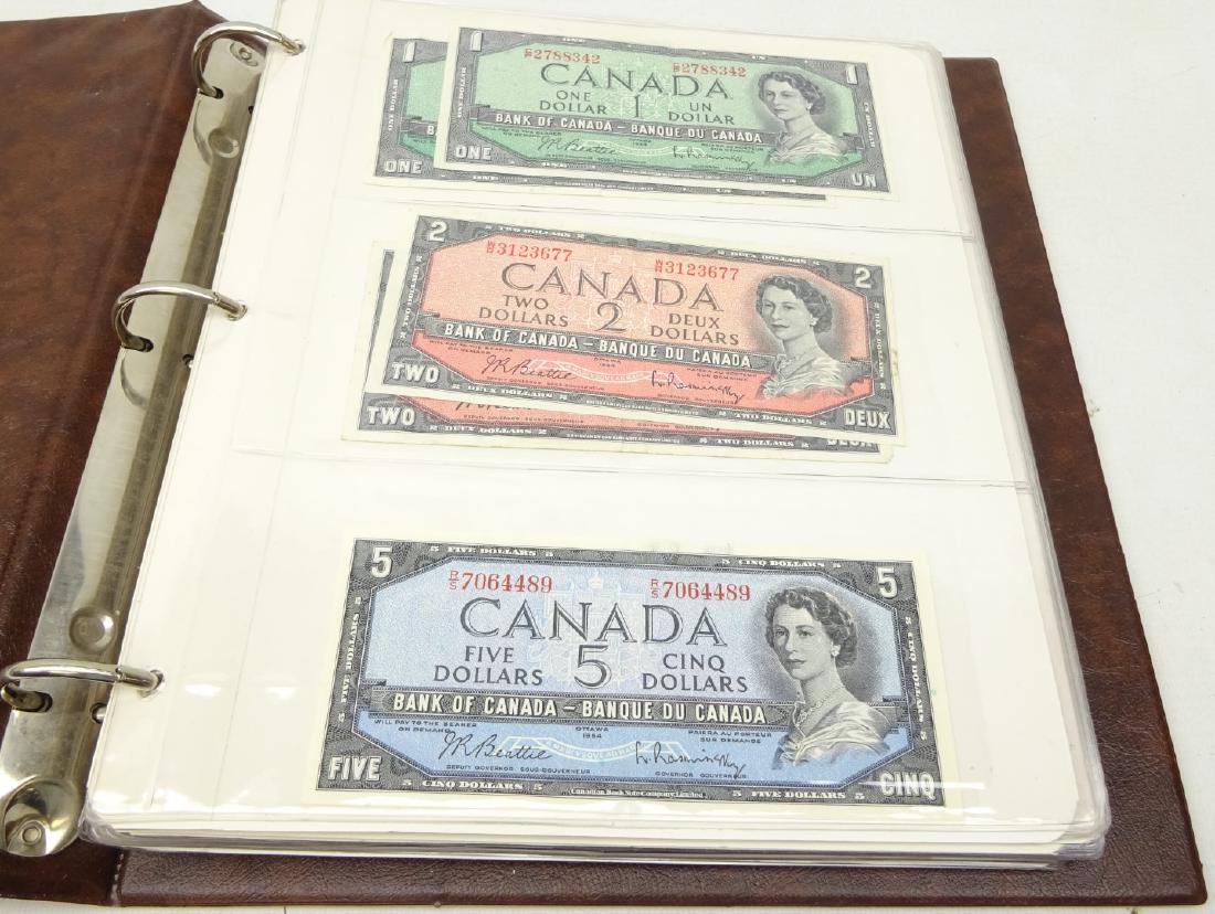 Collection of World banknotes including; two 1 dollar,: Collection of World banknotes including; two 1 dollar, two 2 dollar and one 5 dollar Canadian 1954 notes, seven 1967 Canadian 1 dollar notes, six United States of America 1 dollar bills and three 5 do