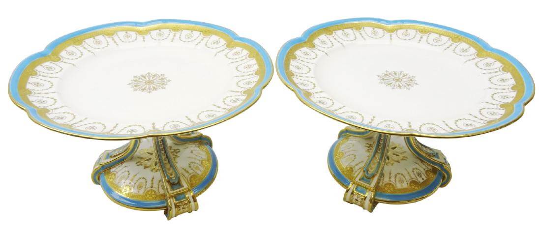 Pair late Victorian Minton tall tazza with gilt central: Pair late Victorian Minton tall tazza with gilt central motif, beaded swags and floral roundels within a gilt and turquoise border on a triform circular scroll base, c1870 pattern no. G154, H15cm x D2