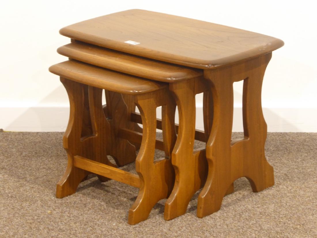 Ercol elm nest of three tables with rectangular top: Ercol elm nest of three tables with rectangular top with rounded corners, W57cm, H42cm, D35vm