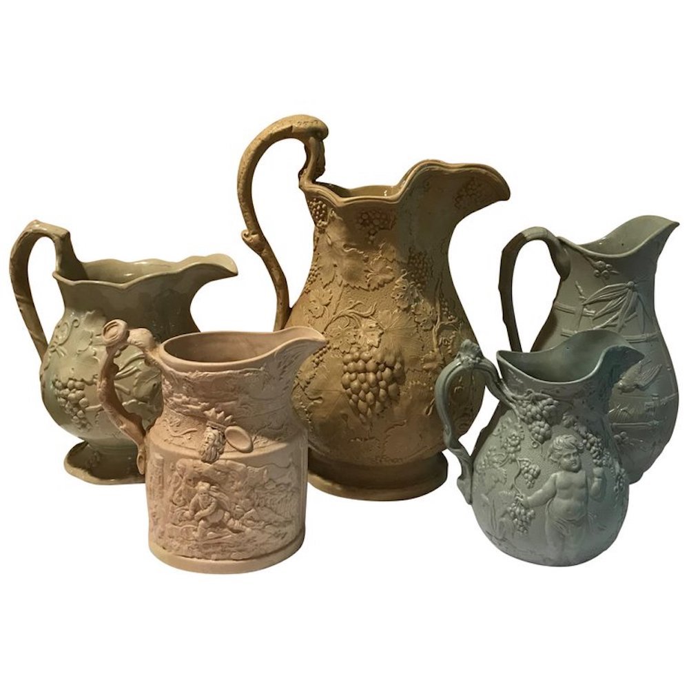 Lot of Five 19th Century Porcelain Relief Pitchers: Lot of five (5) 19th century porcelain relief pitchers, each intricately detailed with floral patterns and or figural sceneries. 1: Minton, Marked 'No. 2', 1830s H 8", D 7.5", W 6" 2: H 5.75", D 5.5",