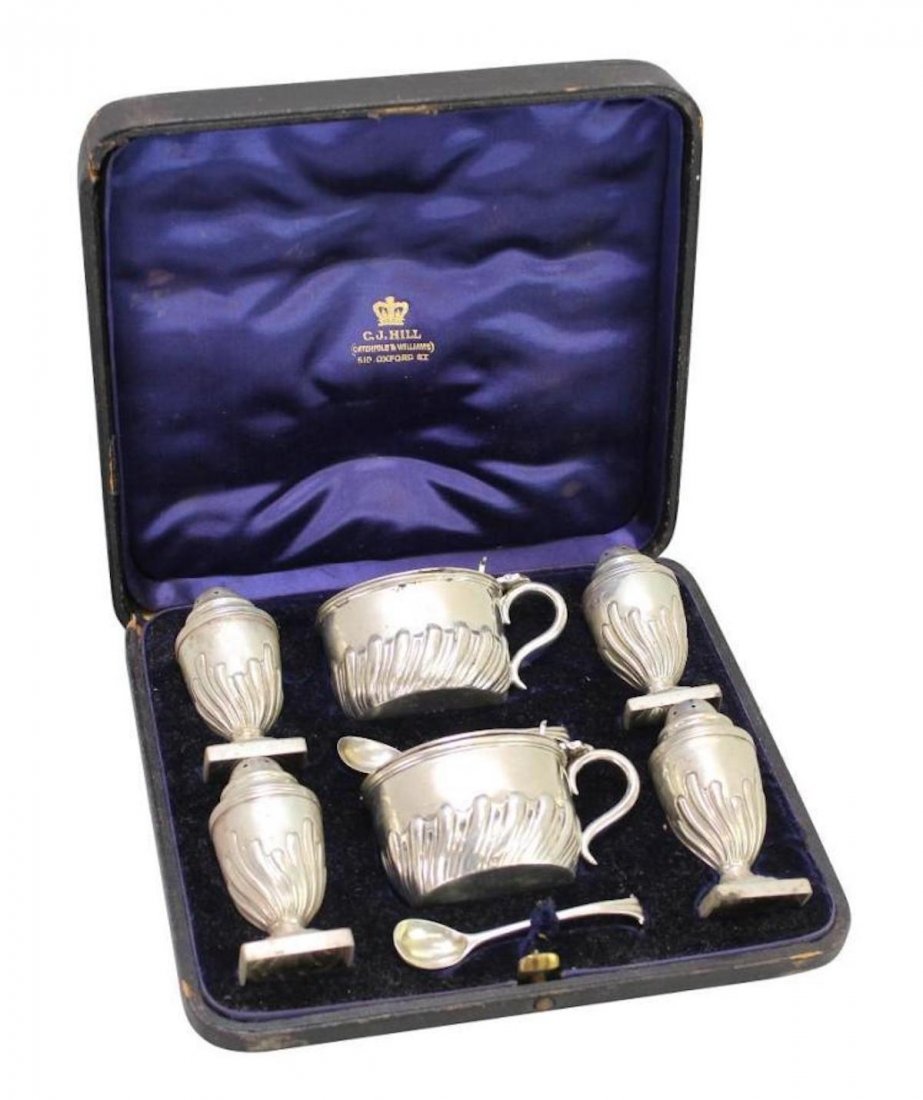 C.J. Hill Cased Sterling Silver Salt and Pepper: 1891/2 George Unite of Birmingham salt and peppers. Master Salt by Henry Stafford of Sheffield dating 1888. Other is unknown maker London 1893. Spoon maker unknown London 1888. Other spoon unknown mak