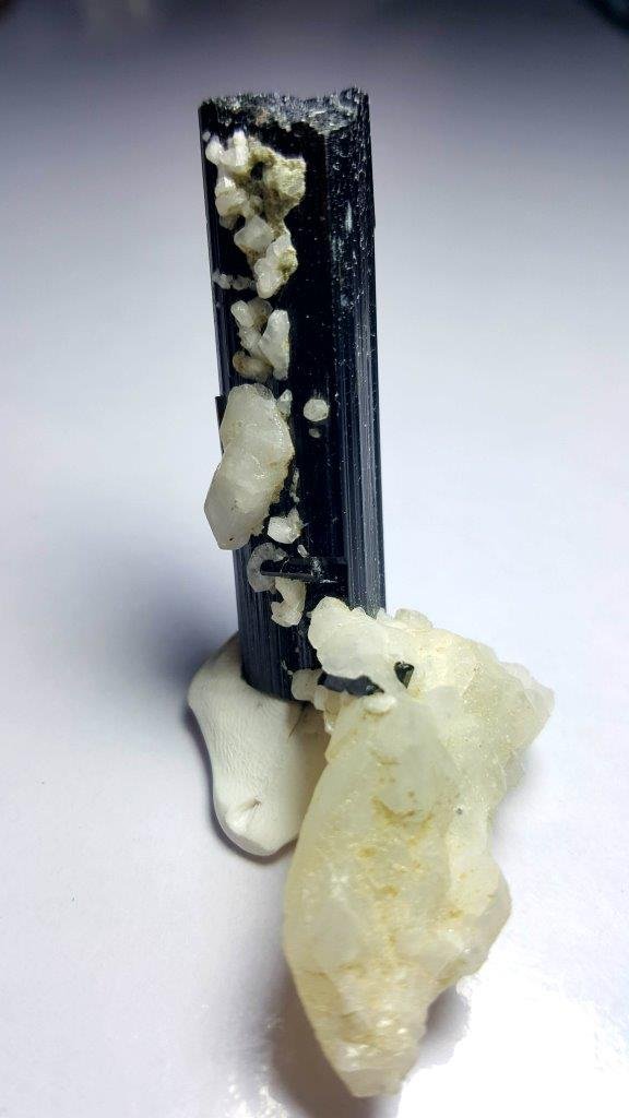 20.82 grams SUPREME QUALITY BLACK TOURMALINE TERMINATED: 20.82 grams SUPREME QUALITY BLACK TOURMALINE TERMINATED CRYSTALS WITH ALBITE: Flat-rate of $23.00 to anywhere. shipping rates are determined by Parcel weight and destination. Combined shipping: Please