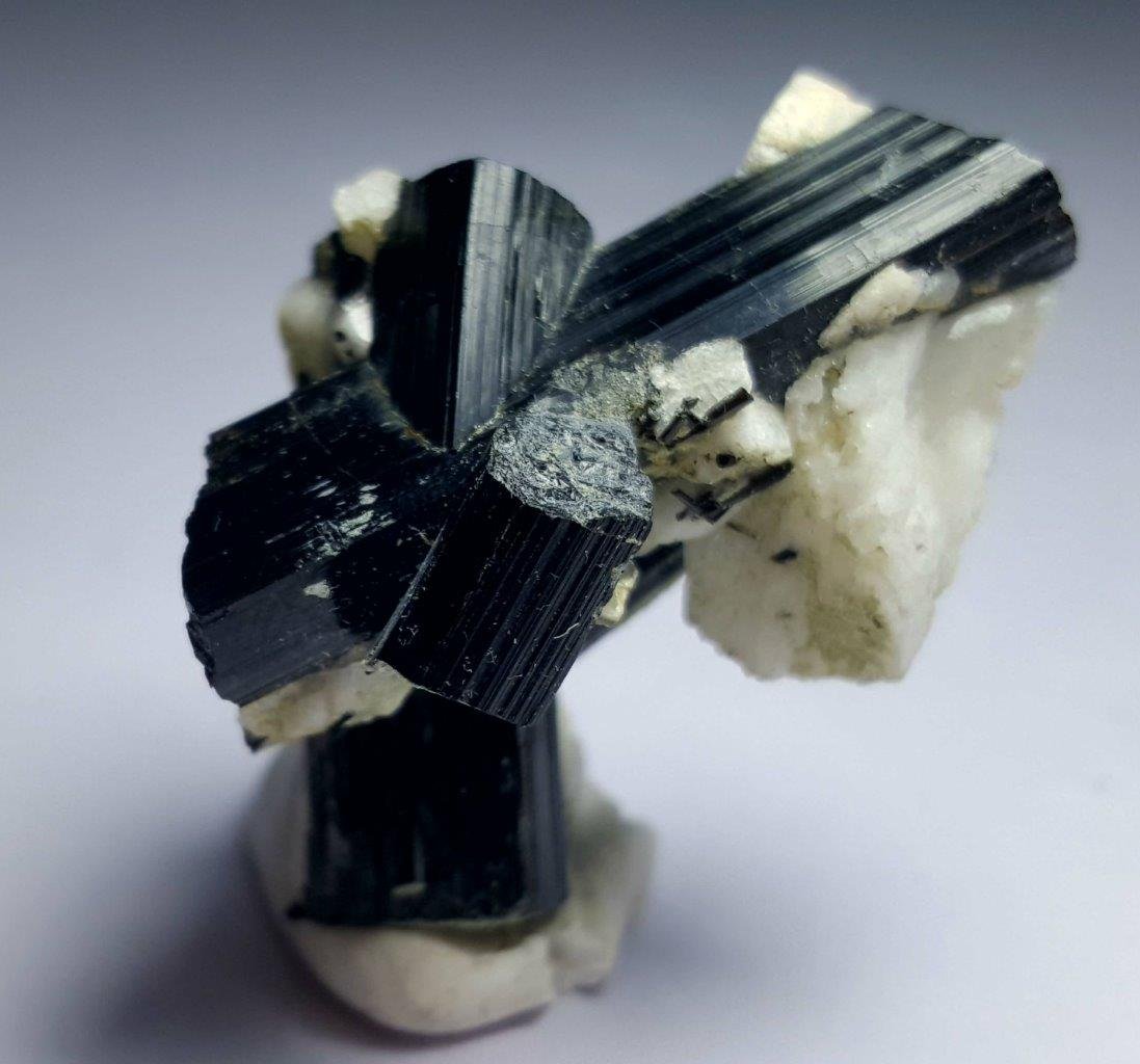 22.04 grams TOURMALINE CRYSTALS WITH ALBITE: 22.04 grams SUPREME QUALITY BLACK TOURMALINE TERMINATED CRYSTALS WITH ALBITE: Flat-rate of $23.00 to anywhere. shipping rates are determined by Parcel weight and destination. Combined shipping: Please