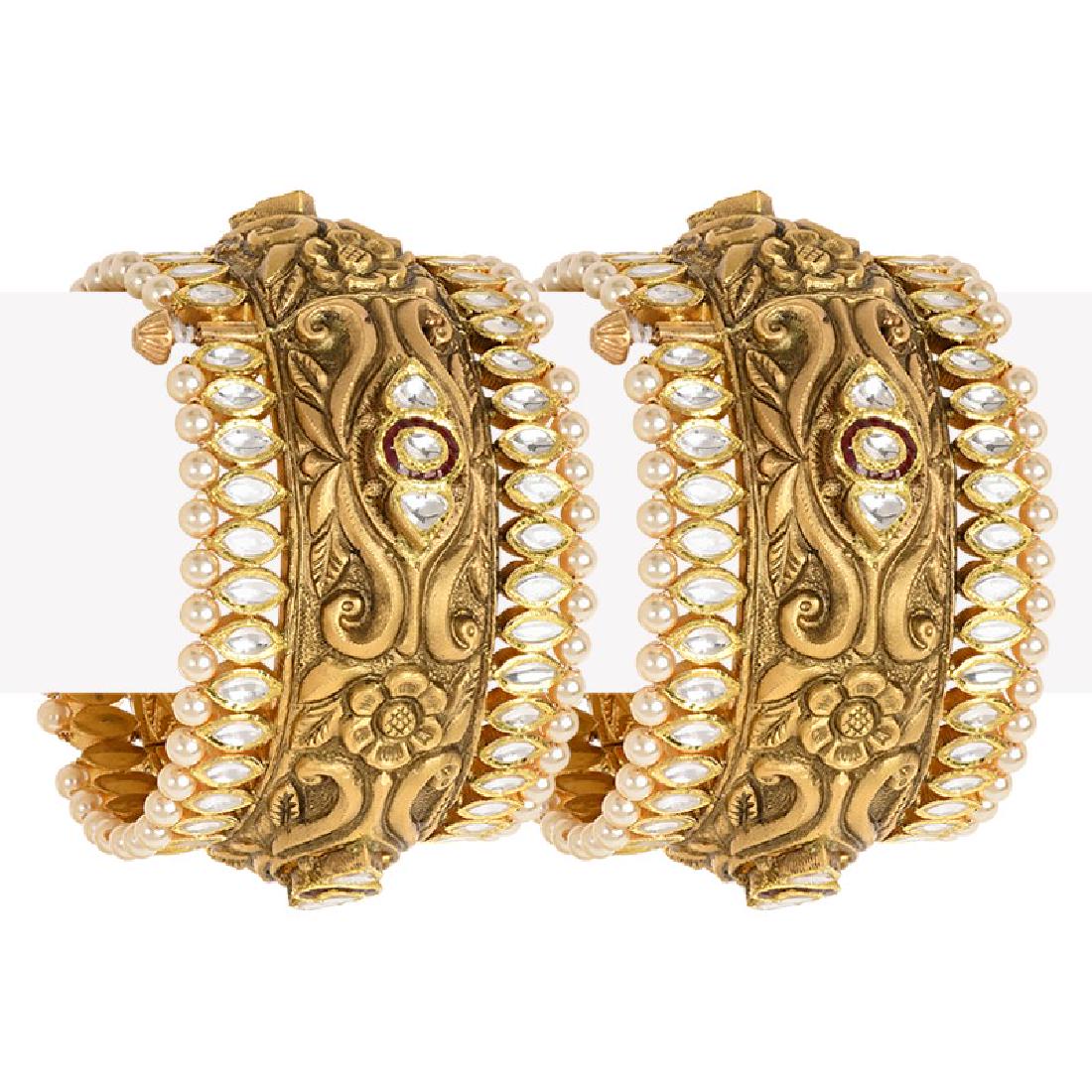 22k Gold Mughal Antique Kundan Kadas: These exquisite design kada bangles will take you back to the Mughal era, intricately handcrafted in 22 karat antique gold, studded with kundan stones Weight: 160 grams, width: 45.1 mm (1.7 inches). :