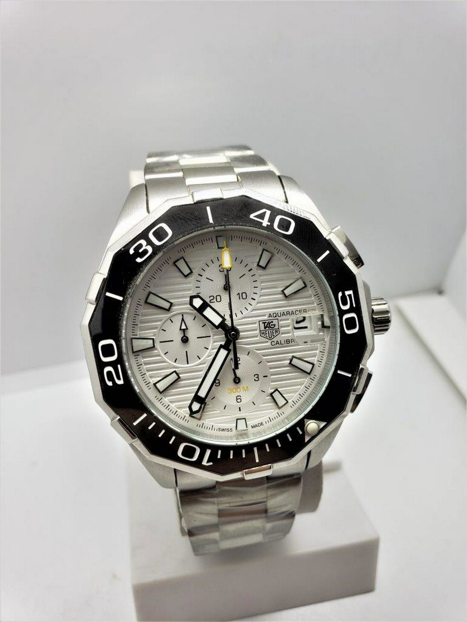 Tag Heuer AquaRacer Automatic Watch for Men: Tag Heuer AquaRacer Automatic Watch for Men : Flat-rate of $23.00 to anywhere. shipping rates are determined by Parcel weight and destination. Combined shipping: We offer combine shipping on multiple 