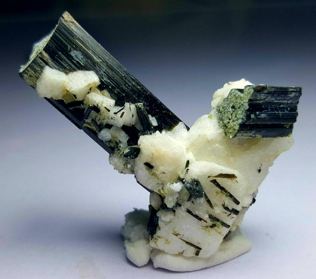 18.69 grams TOURMALINE CRYSTALS WITH ALBITE: 18.69 grams SUPREME QUALITY BLACK TOURMALINE TERMINATED CRYSTALS WITH ALBITE : Flat-rate of $23.00 to anywhere. shipping rates are determined by Parcel weight and destination. Combined shipping: We of