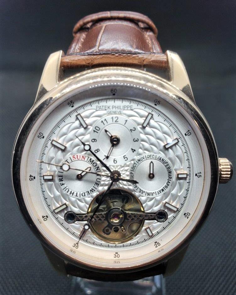 Patek Philippe Geneve Tourbillon Automatic Watch: AAA+ Quality Patek Philippe Geneve Tourbillon Automatic Watch shipping rates are determined by Parcel weight and destination. Combined shipping: We offer combine shipping on multiple items purchased t