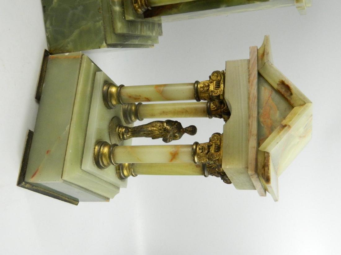 Antique onyx mantle clock with oynx garniture set: Antique onyx mantle clock with oynx garniture set. Condition: Missing pendulum and key, cracked glass face