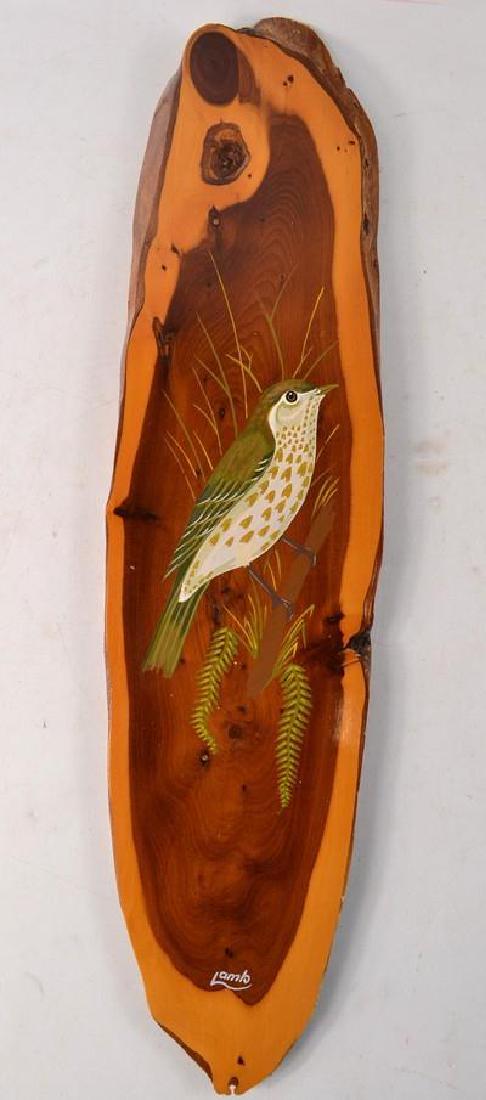 A hand painted wild bird by LAMB: A hand painted wild bird by LAMB. On a varnished piece of sycamore? L: 46cm approx W: 12cm approx