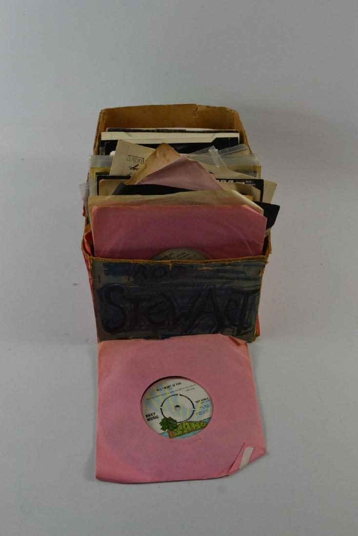 A selection of 76 singles records mostly 70's, to: A selection of 76 singles records mostly 70's, to include quantity of David Bowie, Rolling stones, Iggy Pop, Bryan Ferry and many more