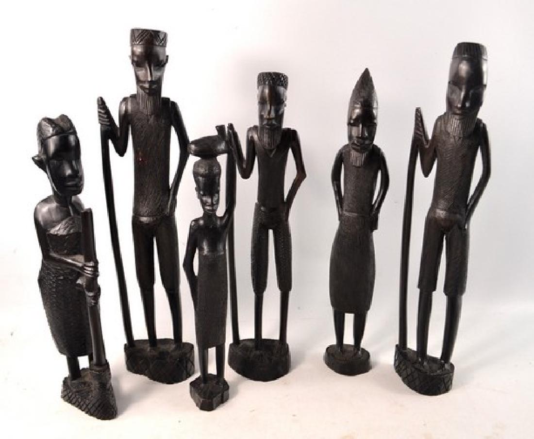 Six African carved standing figures (1 of 3)