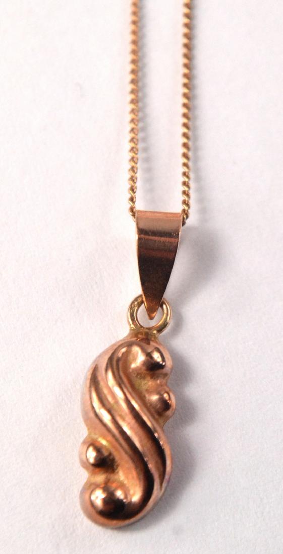 9ct rose gold pendant on 9ct rose gold fine link chain.: 9ct rose gold pendant on 9ct rose gold fine link chain. Gross weight approx 1.2g