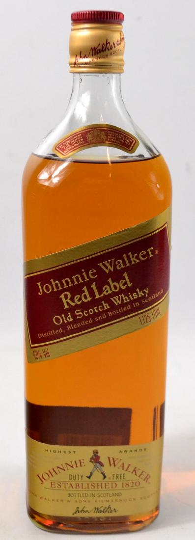 Bottle of 1.125L Johnnie Walker Red Label whisky.: Bottle of 1.125L Johnnie Walker Red Label whisky. W: 8.5cm approx D: 8.5cm approx H: 29.5cm approx Gross weight approx 1.8kg Unopened with no issues to labels Condition reports are offered as a guide 