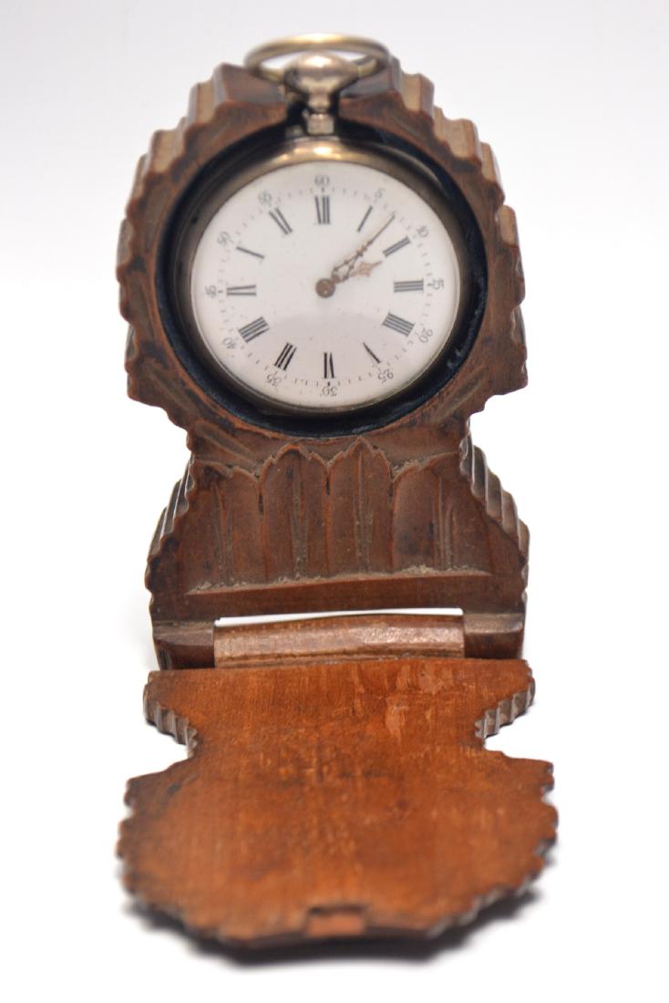 White metal pocket watch in a vintage black forest (1 of 5)