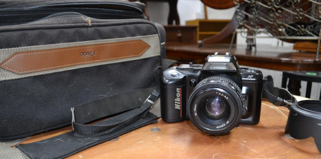 NIKON F-4 01 35mm camera with a NF NIKKOR 35-70mm lens, (1 of 1)