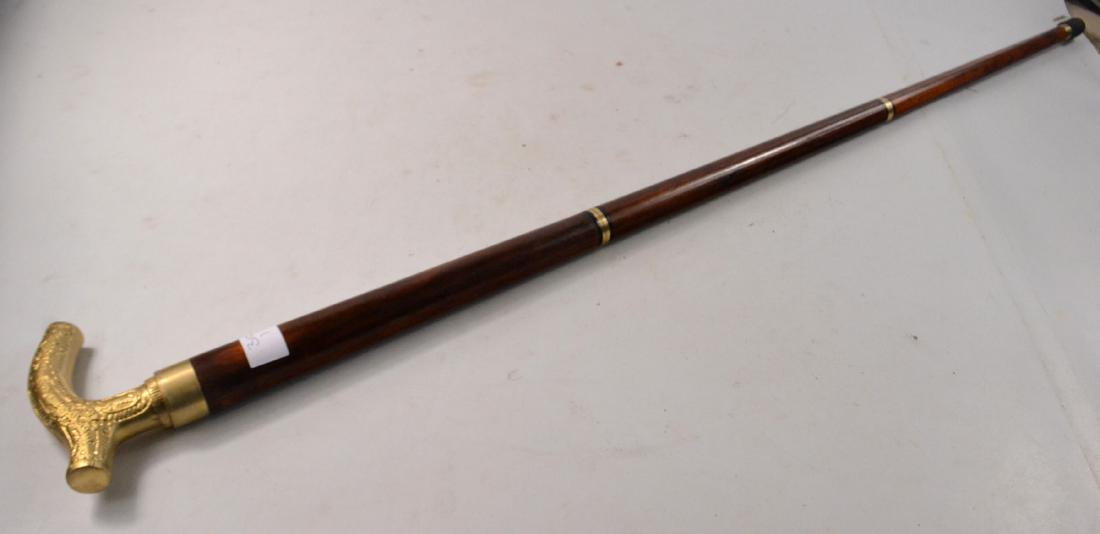 Brass handled walking stick in, multiple sections with (1 of 3)