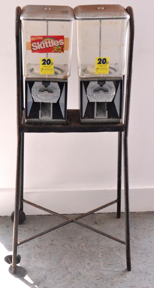 FAIRGROUND twin bubble-gum dispenser machines on a: FAIRGROUND twin bubble-gum dispenser machines on a stand c1970's Approx 1 pieces