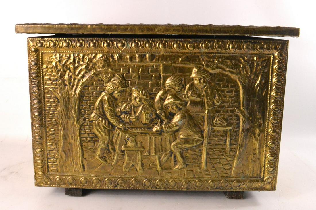 Brass lidded repousse style fireside log box featuring: Brass lidded repousse style fireside log box featuring a taverna scene