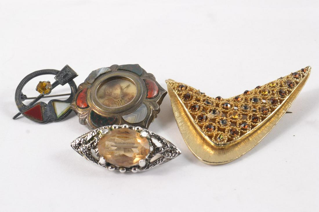 Small box containing four vintage brooches (1 of 1)