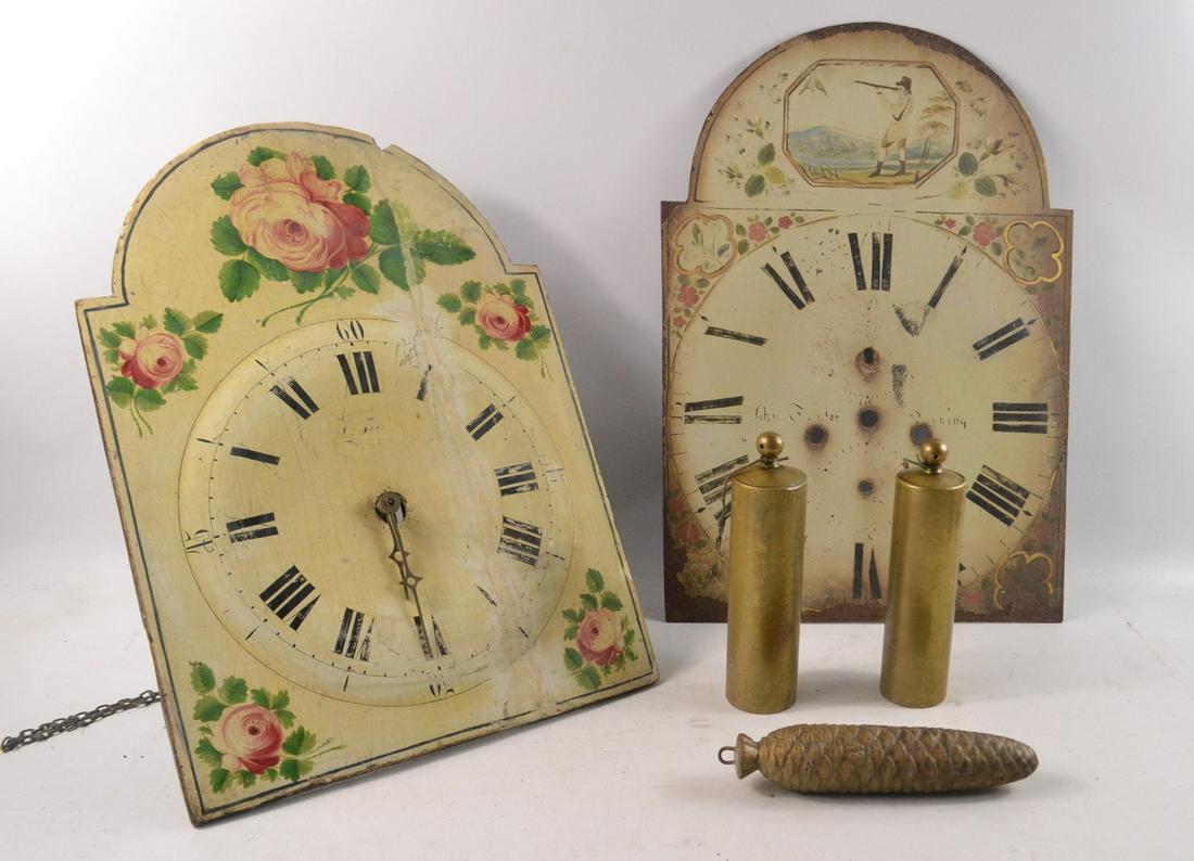 Two painted grandfather/grandmother clock faces and: Two painted grandfather/grandmother clock faces and some clock weights. Floral 33cm approx wide with movement , John Taylor with gentleman hunting 33cm no movement Approx 5 pieces
