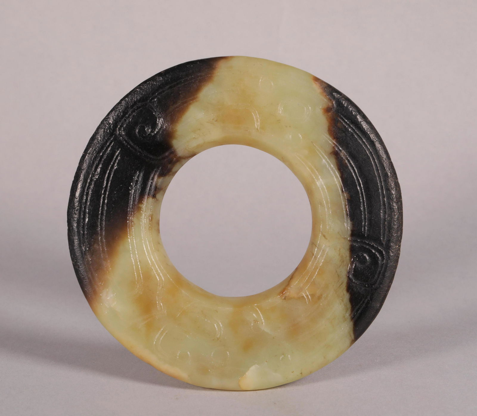 A CHINESE VINTAGE OLD JADE DISC "BI" (1 of 8)