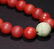 A CHINESE VINTAGE RED AGATE HAND CHAIN - 8