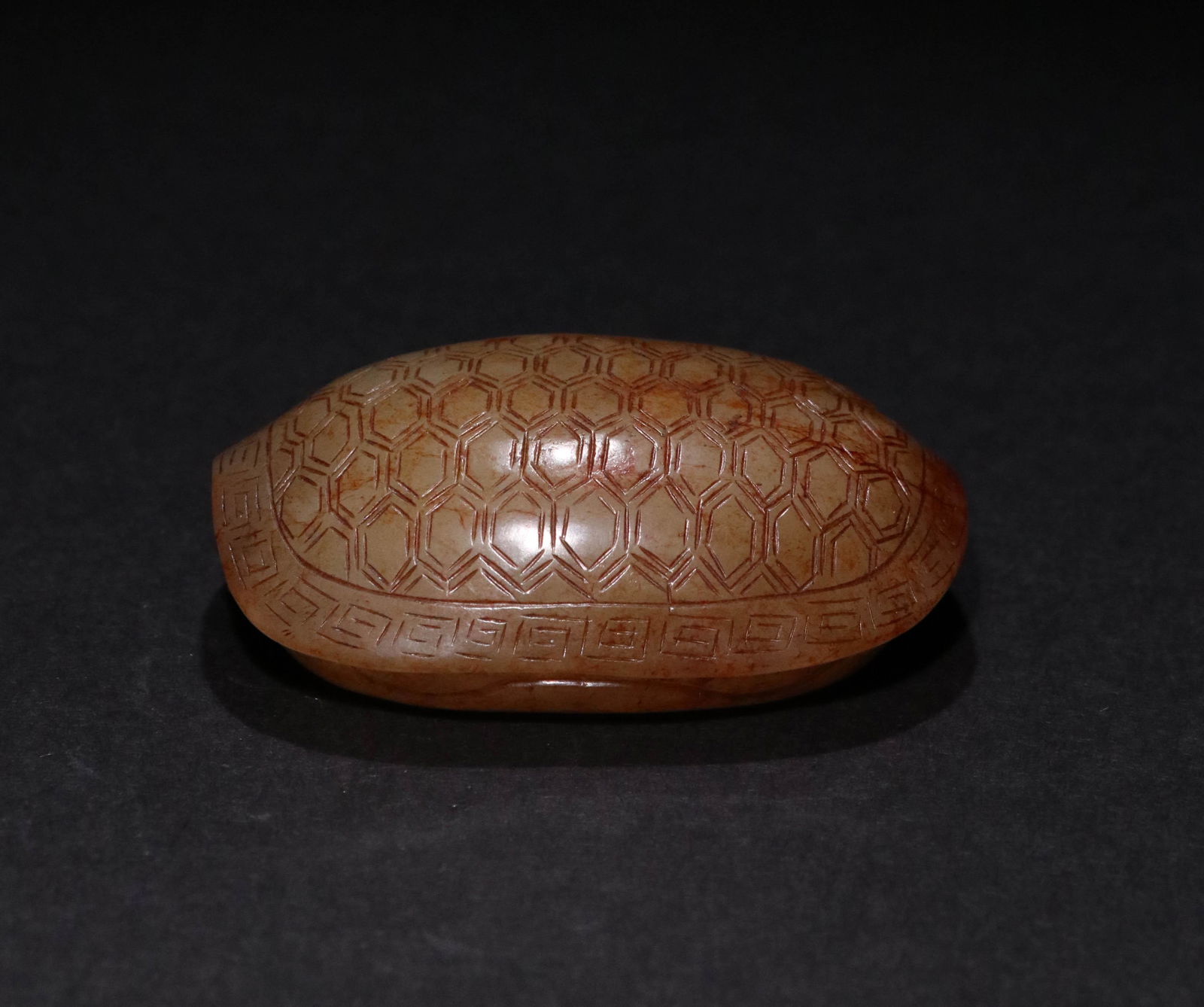 A JADE DISPLAY OBJECT: A JADE DISPLAY OBJECT IN TURTLE SHELL SHAPE. L: 5.6cm W: 4cm WT: 83g