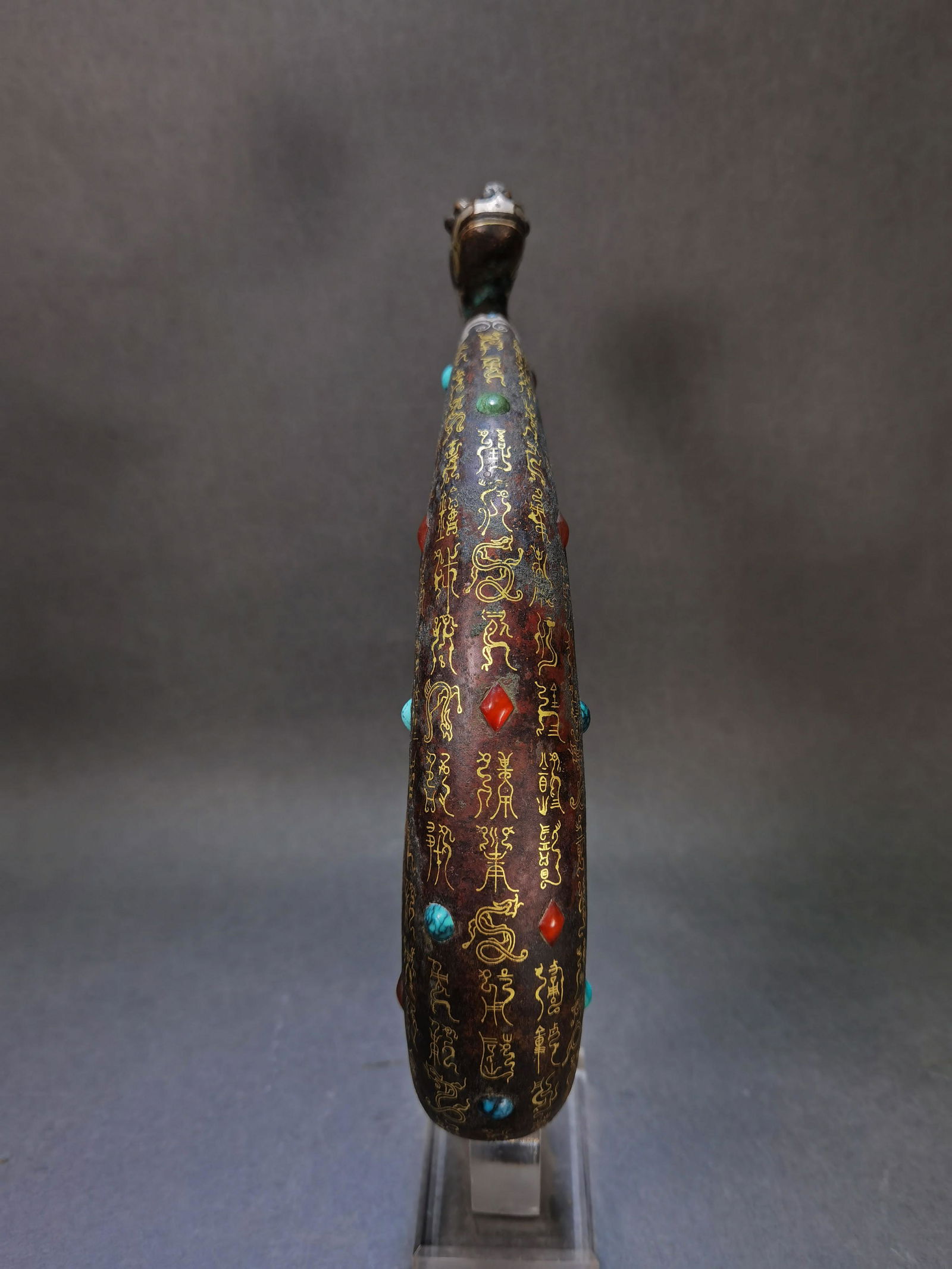 A CHINESE VINTAGE BRONZE BELT HOOK (1 of 7)