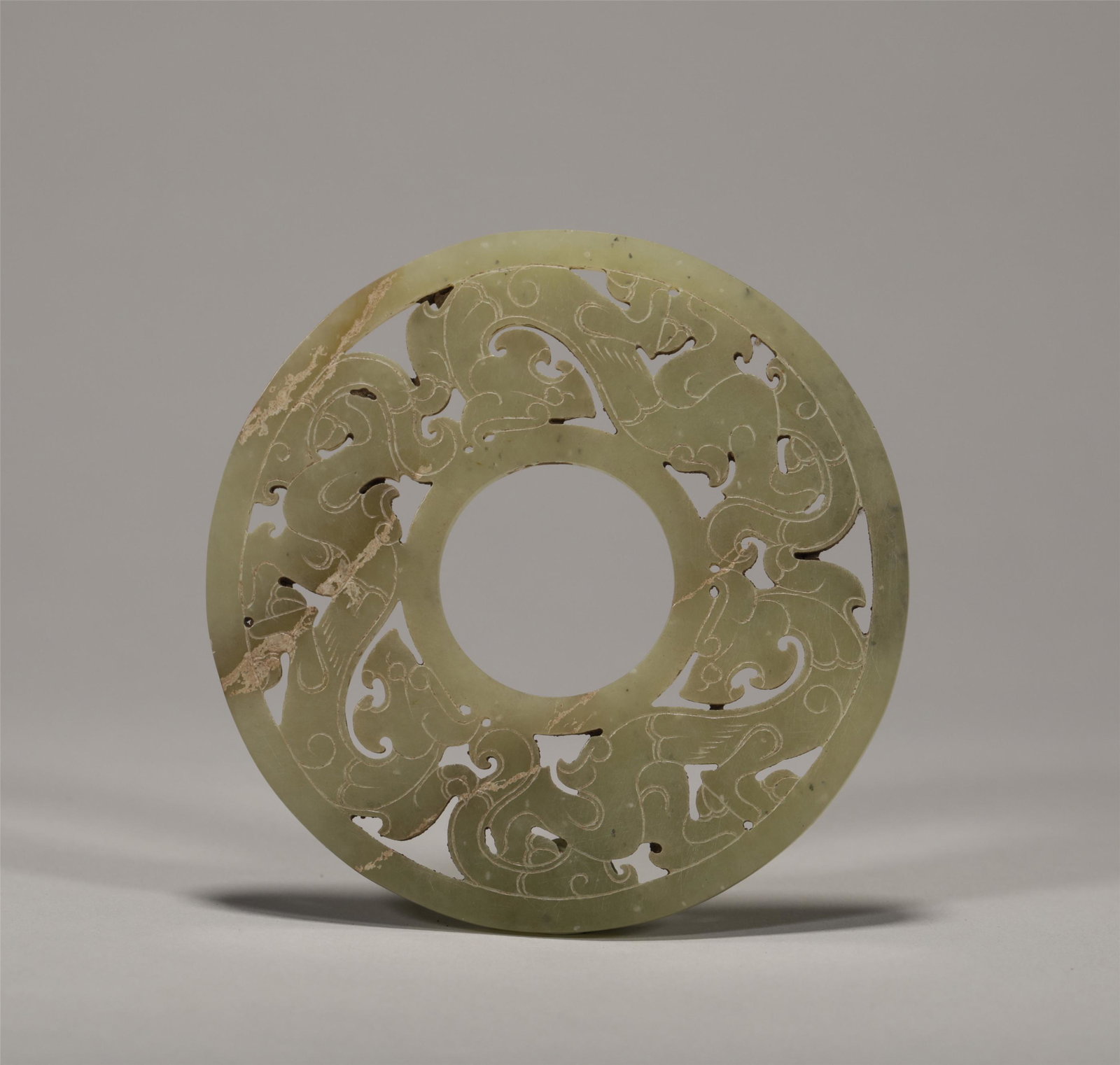 A CHINESE VINTAGE JADE DISC BI (1 of 6)