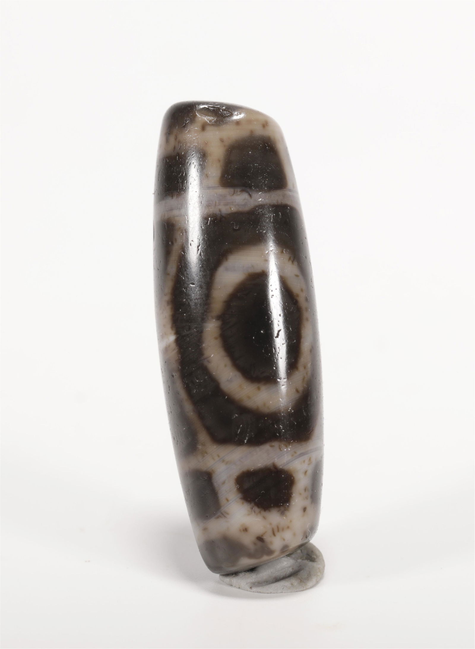 A TANG STYLE DZI BEAD TIANZHU (1 of 6)