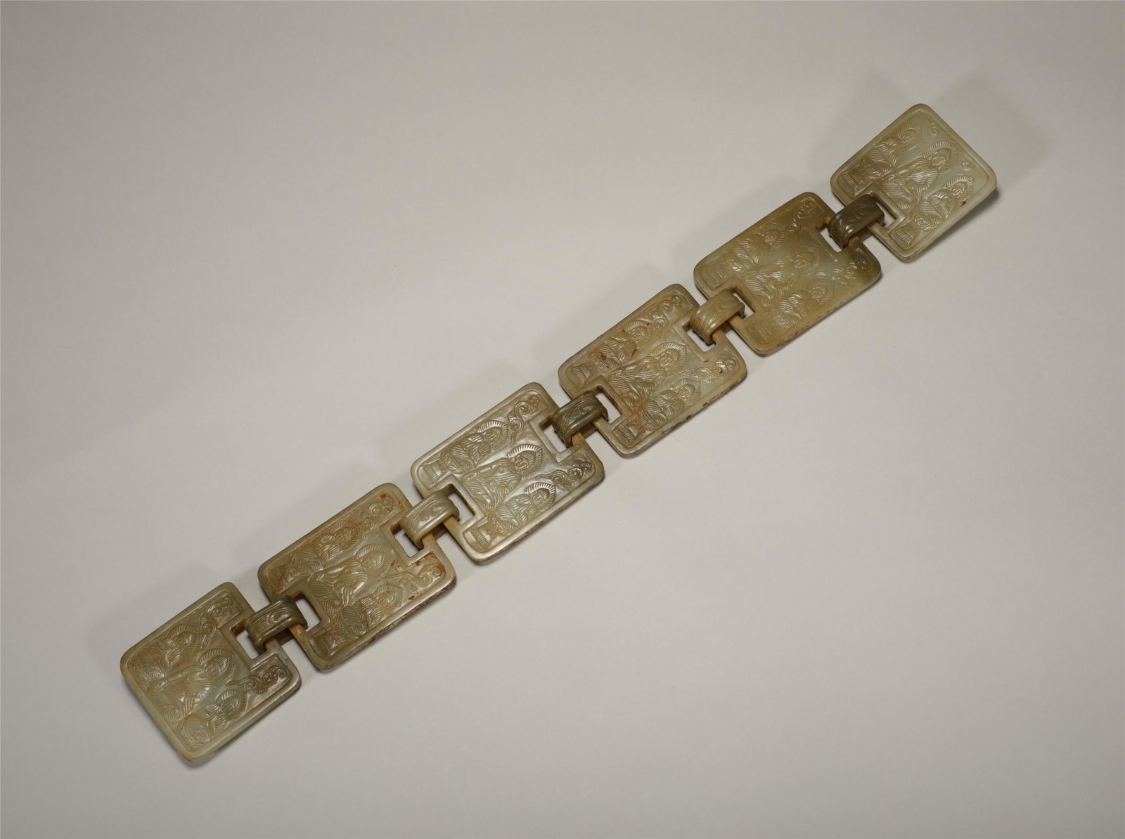 A DECORATIVE JADE ITEM (1 of 7)