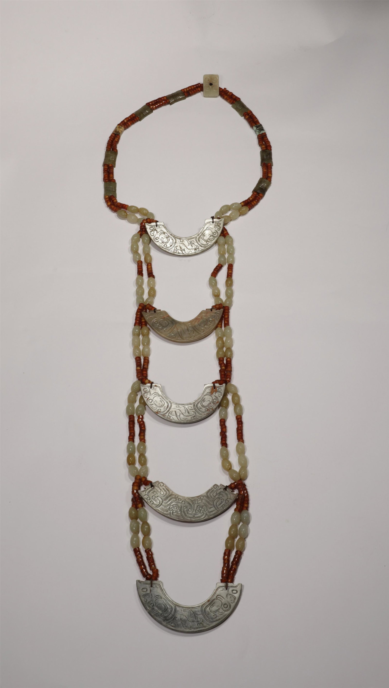 A SET OF JADE PENDANTS (1 of 10)