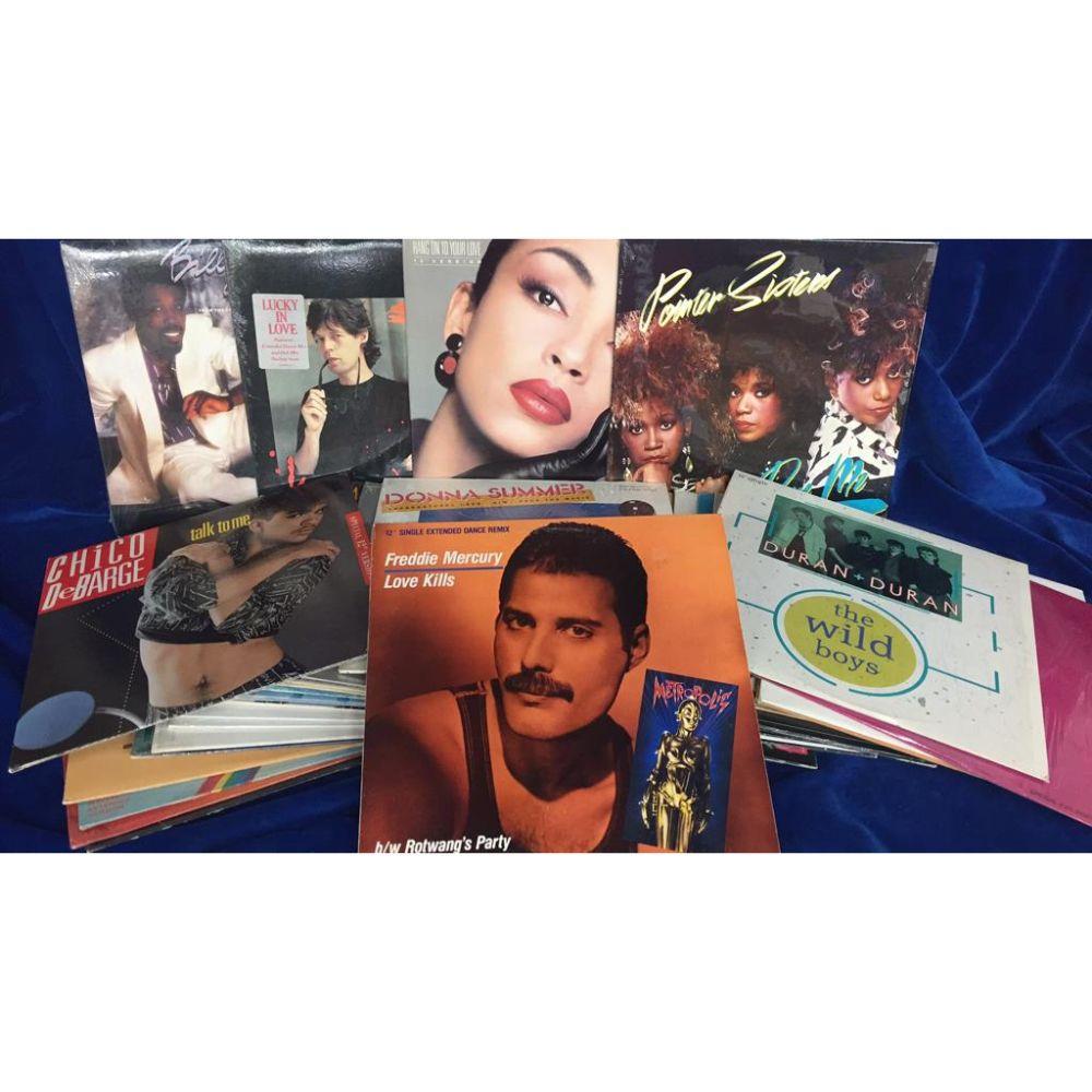 (45) High Grade 12" Disco Single LP's -: Lot (45 Different) High Grade 45 RPM 12" Disco Singles to include artists Donna Summer, Duran Duran, Freddie Mercury, Pointer Sisters, Sade (promo), Mick Jagger, Billy Ocean, Shalamar, Village People,