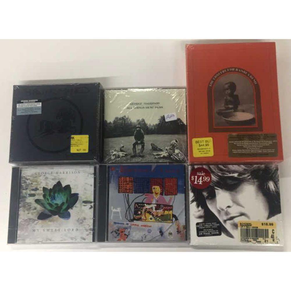 (6) Sealed -George Harrison Music CD's: "My Sweet Lord", "Songs by", "Electric Sound", "All Things Must Pass" 2 CD, "Brainwashed" & "Concert for Bangla Desh" Deluxe 2 DVD Boxed Set
