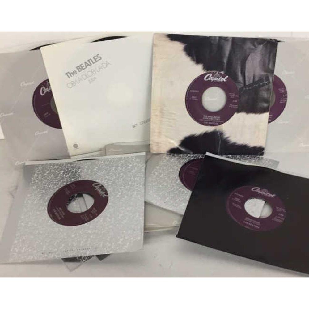New/Old Dealer Stock - (14 Different) 1988 Beatles: Capitol Records Purple Label Re-Issue 45 RPM Records w/Orig Sleeves - 2056 Hell Goodbye, 2138 Lady Madonna, 2276 Hey Jude, 2490 Get Back, 2531 Ballad of John & Yoko, 2654 Something, 2764 Let It Be, 28