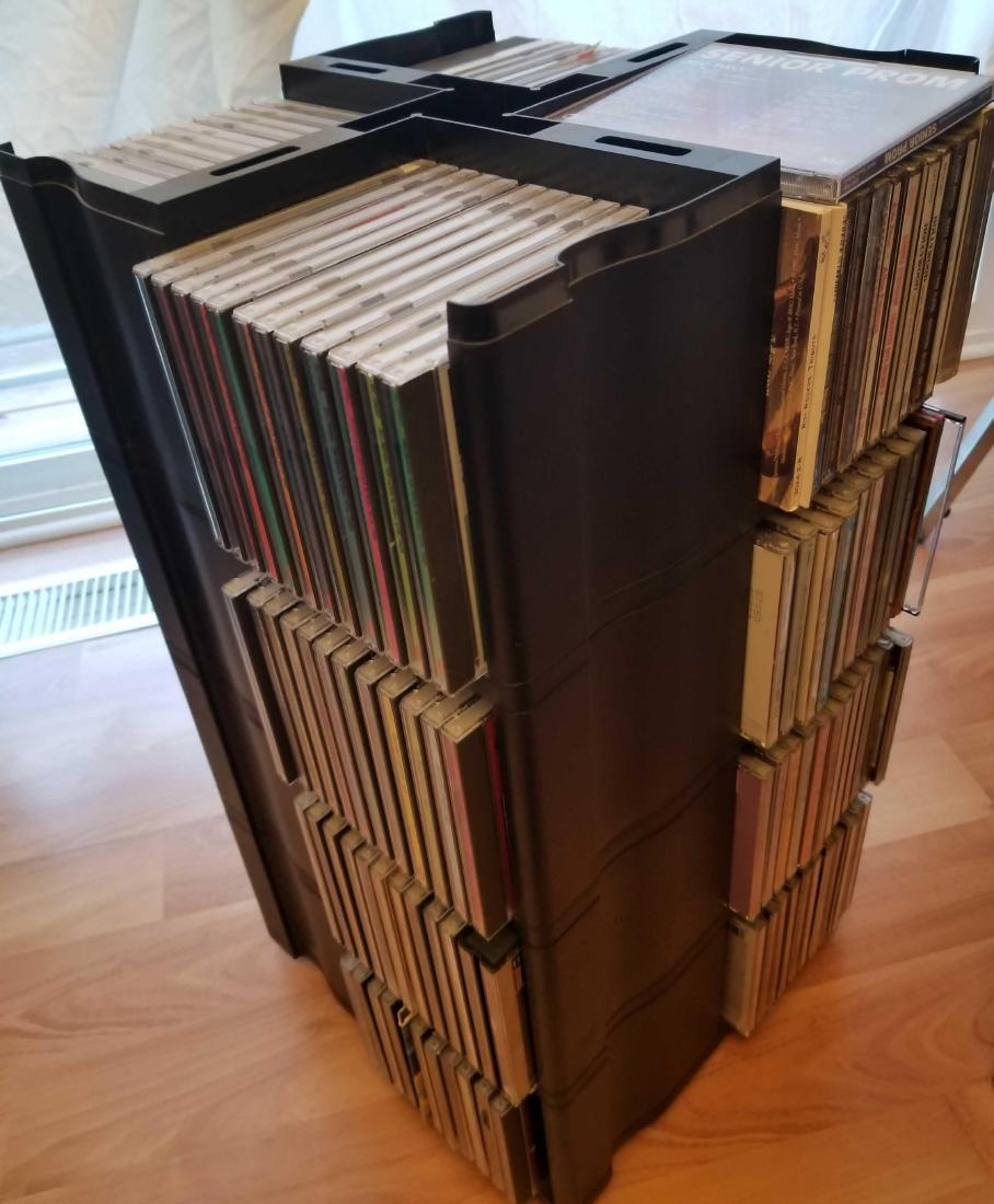 Large lot of CDs: You get the storage racks (stacking) and all CDs. Together with a few Richard Simmons DVDs.