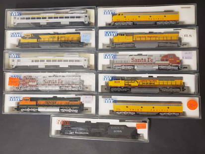 11 assorted Kato trian set locomotives: All appearing in excellent condition within original packaging. Most with price tags near $100. Each box measures approximately 7.5" long. See photos for individual model numbers.