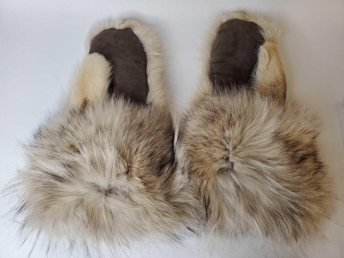 Alaskan wolf gloves: The gloves in excellent condition, each measuring approximately 16" long, 10" wide at base.